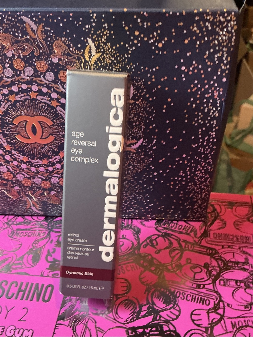dermalogica Age Reversal Eye Complex in gray and burgundy packaging